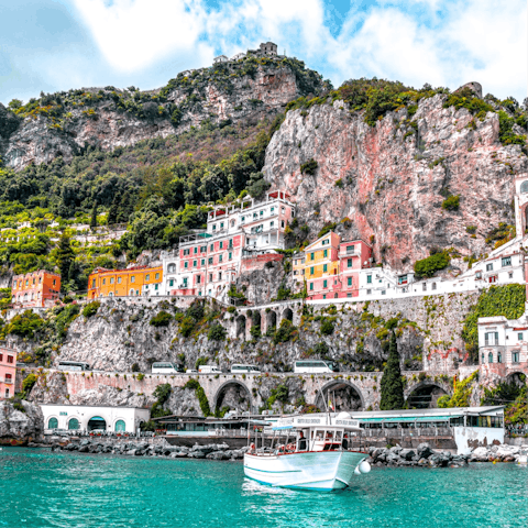 Explore the scenic towns and secret coves of the Amalfi Coast