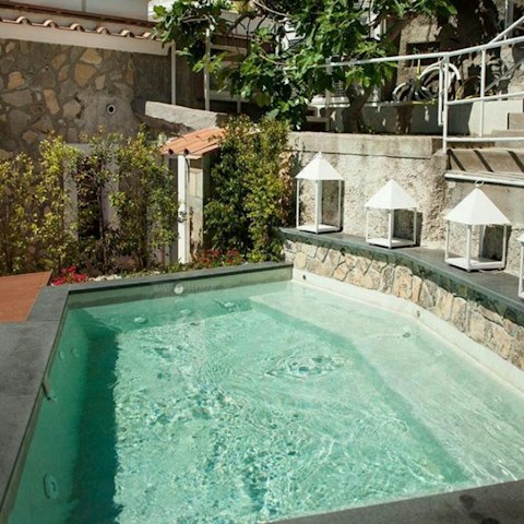 Take a refreshing dip in the private cliffside pool