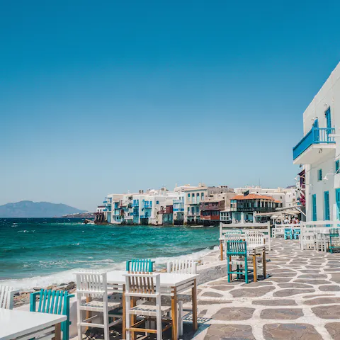 Spend your days on beautiful beaches and the famous marina of Mykonos