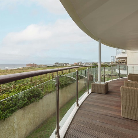 Unwind after a busy day on the private balcony