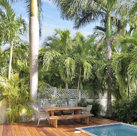 Gather around the bench-style table for an alfresco lunch of barbecued local produce