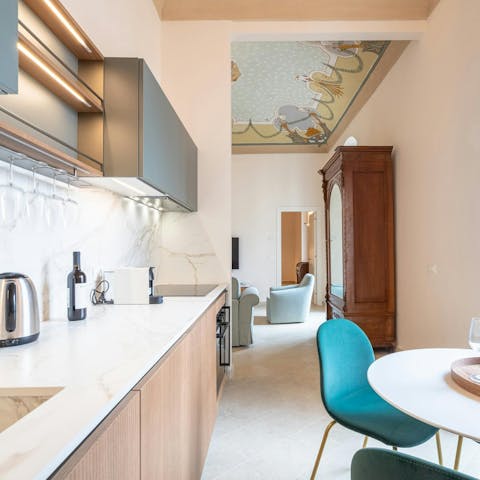 Admire the beautiful frescoed ceiling at this apartment