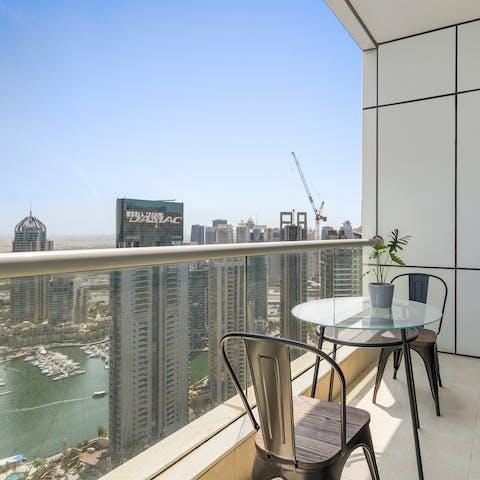 Sit out on the glass-fronted balcony for mesmerising Dubai Marina views