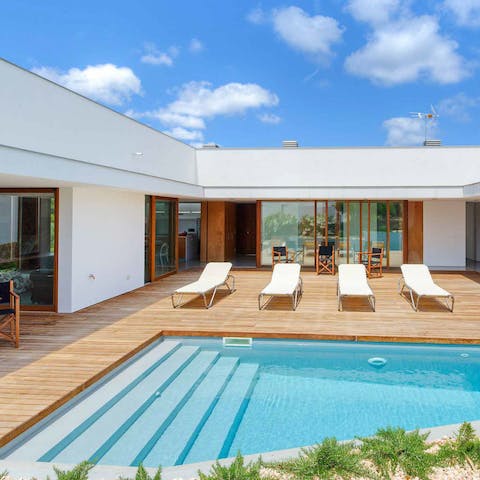 Spend your days by the pool or swimming in its cool waters