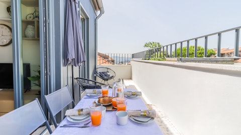 Enjoy rabanadas on the private balcony