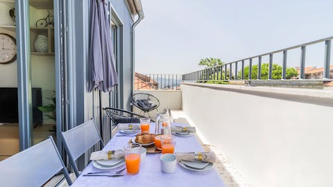 Enjoy rabanadas on the private balcony