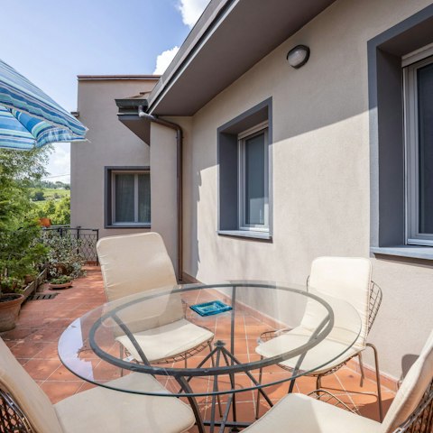 Plan your day over espresso on the patio