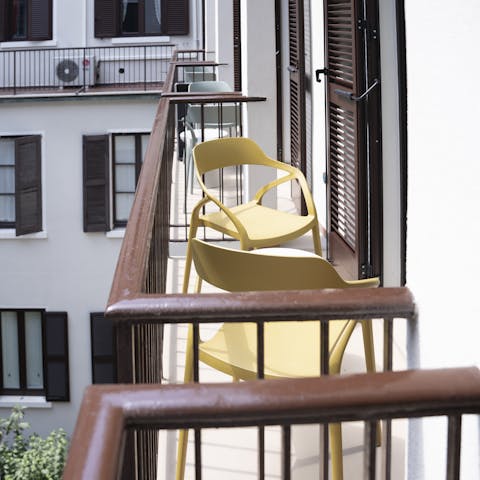 Sip limoncello on the cosy private balcony