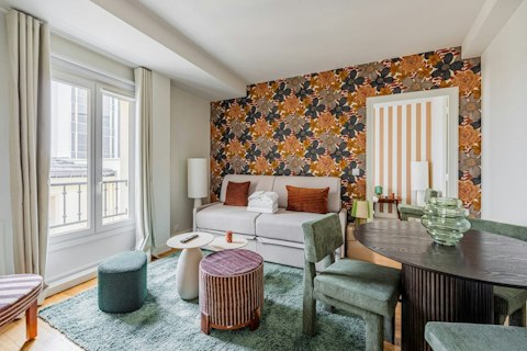 Settle into a bold, character-filled living space in the 8th arrondissement