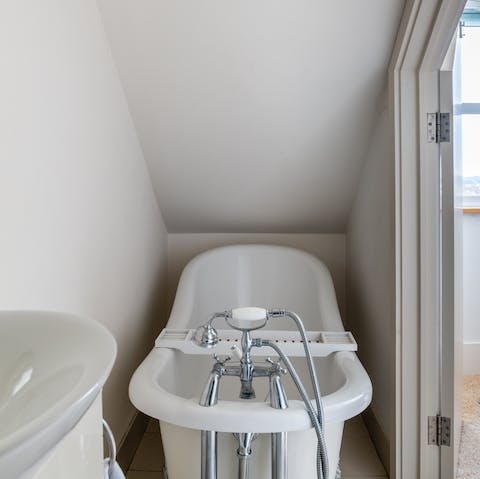 Get squeaky clean in one of the two bathtubs