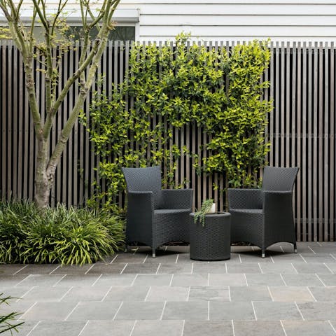Unwind with a glass of Australian wine in the courtyard