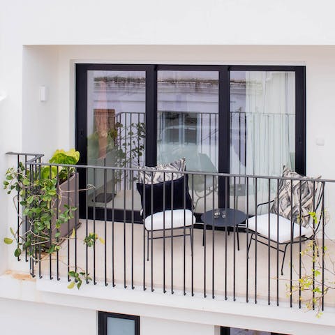 Start the day with an alfresco cup of café con leche on the private balcony