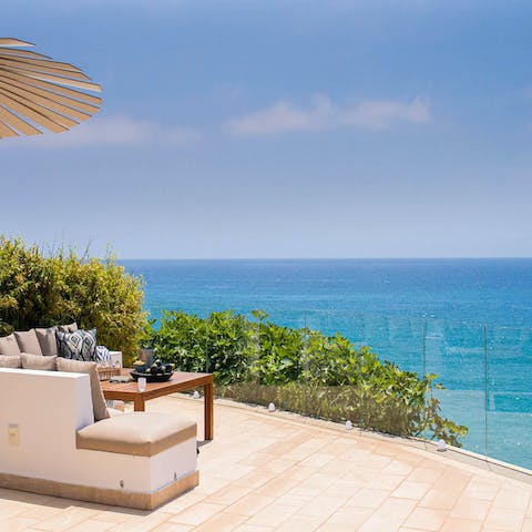 Enjoy uninterrupted panoramic views of the Balcon de Europa from the club's shared terrace