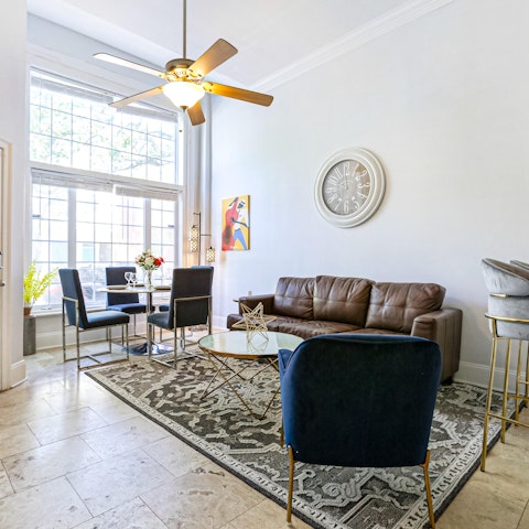 Kick back in the stylish living room with a cold drink after a day of exploring