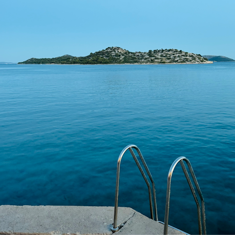 Explore Tribunj's coastline, less than a ten-minute stroll away