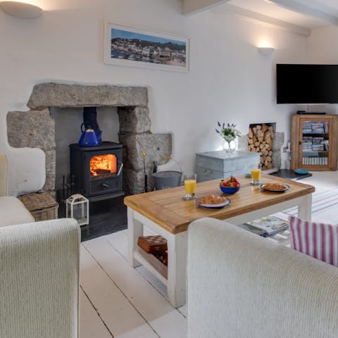 Relax in front of a roaring fire after a day on the beach