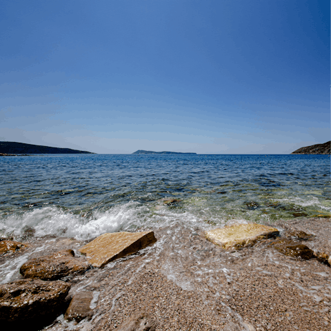 Relax on beautiful Srima North Beach, a six-minute stroll away