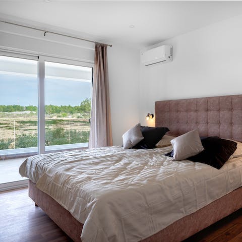 Wake up to the views over the countryside in the bedroom