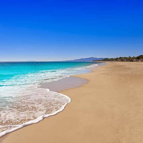 Stroll along the stunning golden beaches