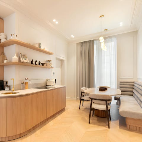 Prepare meals in the chic wraparound kitchen and dining area