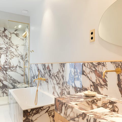 Pamper yourself in the decadent marble en-suite
