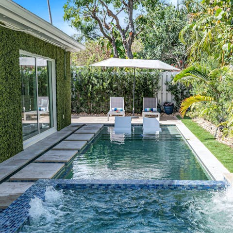 Work on your tan, then take a dip in the heated swimming pool