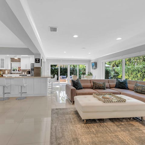 Unwind together as a group in the breezy, open-plan living area