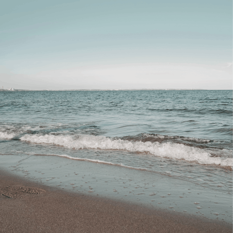 Spend an afternoon relaxing on the soft sands of Limnonari Beach, a ten-minute drive away