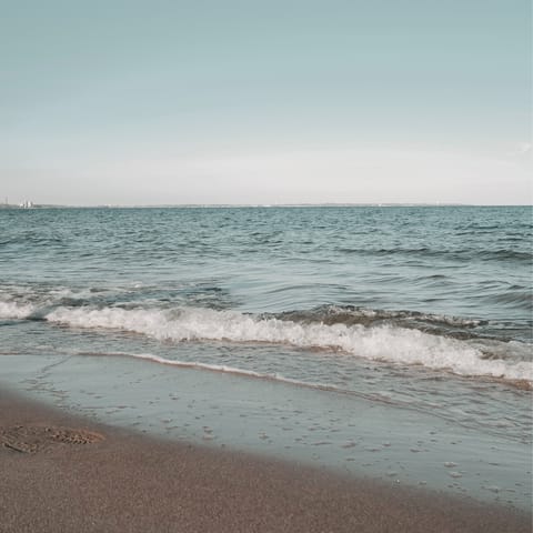 Spend an afternoon relaxing on the soft sands of Limnonari Beach, a ten-minute drive away