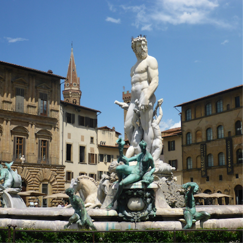 See the Fountain of Neptune, just outside the door