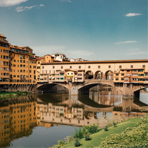 Visit the Ponte Vecchio, a one-minute walk away