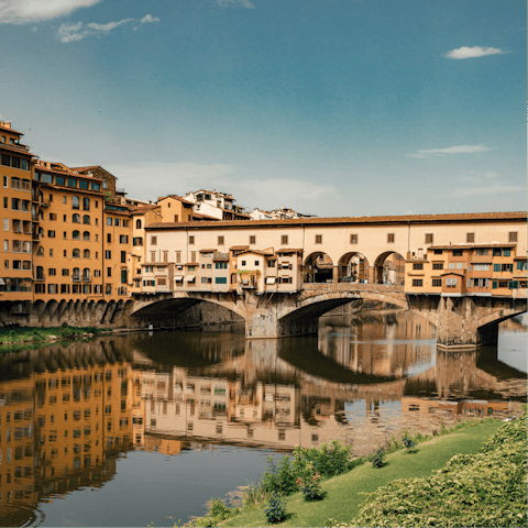 Visit the Ponte Vecchio, a one-minute walk away