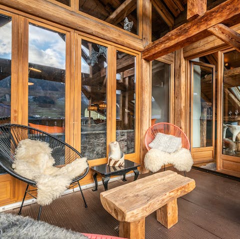 Enjoy a romantic après ski on the terrace overlooking the mountains of Morzine