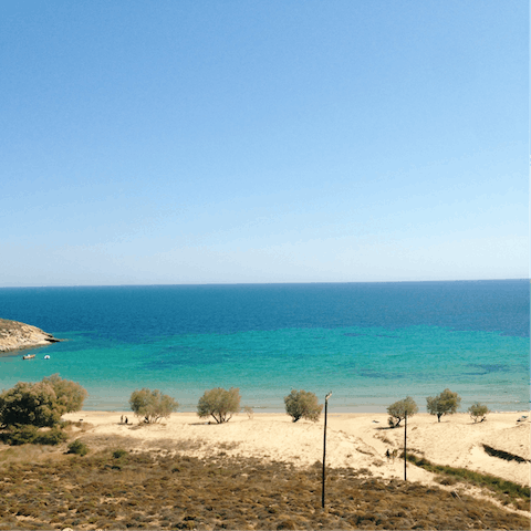 Head for Ornos Beach to enjoy a day on the golden sand – it's just two kilometres away