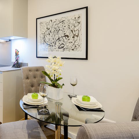 Share delicious meals with your friends in the modern dining area