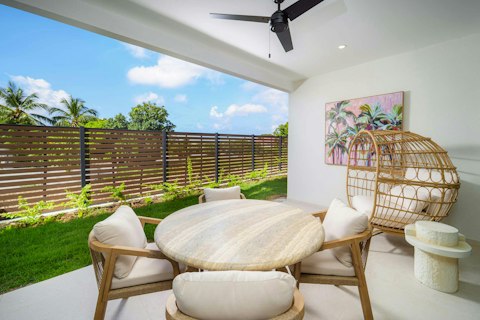Share meals alfresco on the shaded terrace beside the lawn