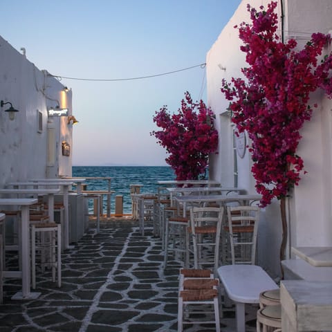 Wine, dine, and soak in the culture of the local town of Parikia, just a ten-minute drive from home
