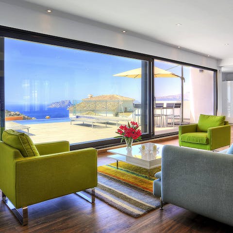 Blend indoor and outdoor living with a sleek wall of glass doors