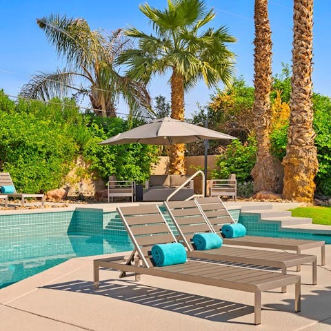 Sunbathe beside the pool