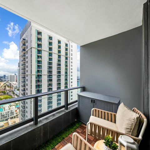 Sit on the balcony with a glass of wine