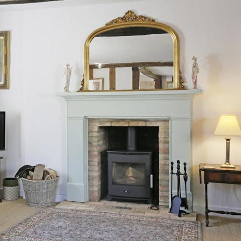 Warm up by the wood-burning stove in the evening