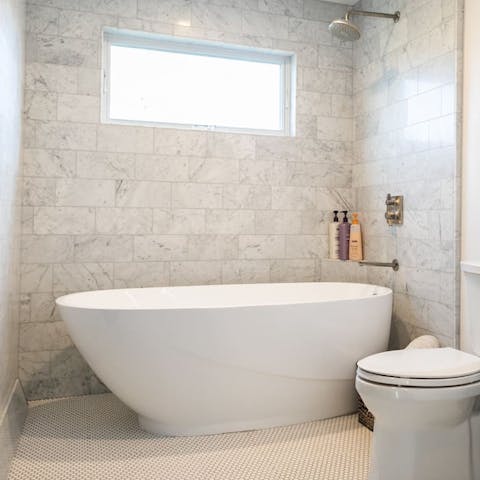 Bring back a bottle of red and enjoy a couple of glasses in a relaxing bubble bath