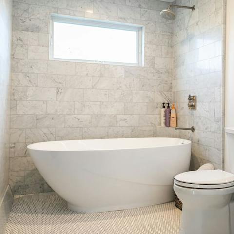 Bring back a bottle of red and enjoy a couple of glasses in a relaxing bubble bath