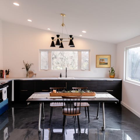 Sit down with a bite to eat and admire the home's contemporary design