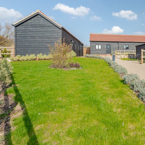 Relax in the lawned gardens amidst the fresh country air