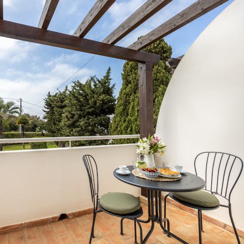 Start the morning off with a cup of coffee and a pastel de nata on the balcony