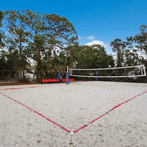 Immerse yourself in the beach experience with a game of volleyball