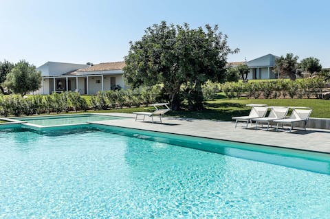 Lay back on a sun lounger by the private pool before having a refreshing swim