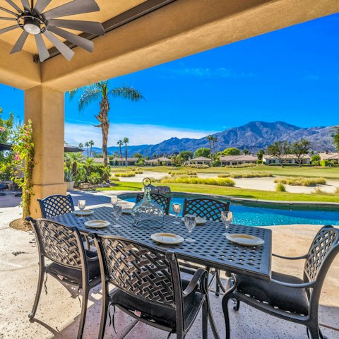 Enjoy an alfresco meal in the shaded outdoor dining area