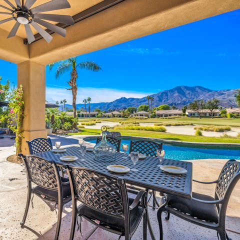 Enjoy an alfresco meal in the shaded outdoor dining area
